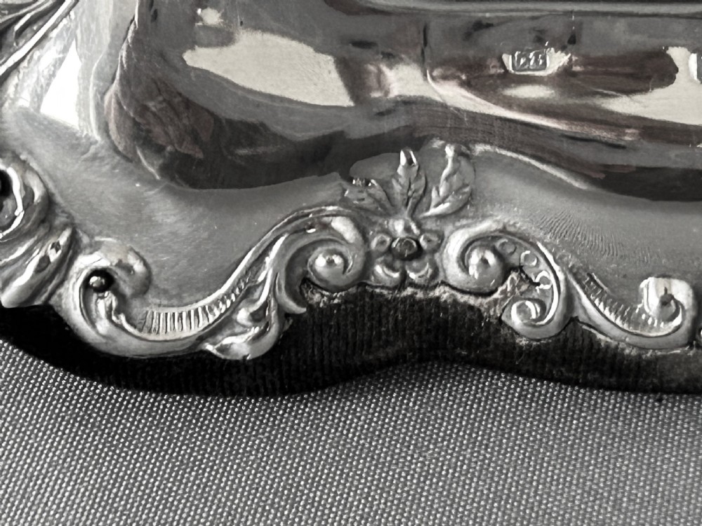 A handsome Edwardian silver table mirror View III