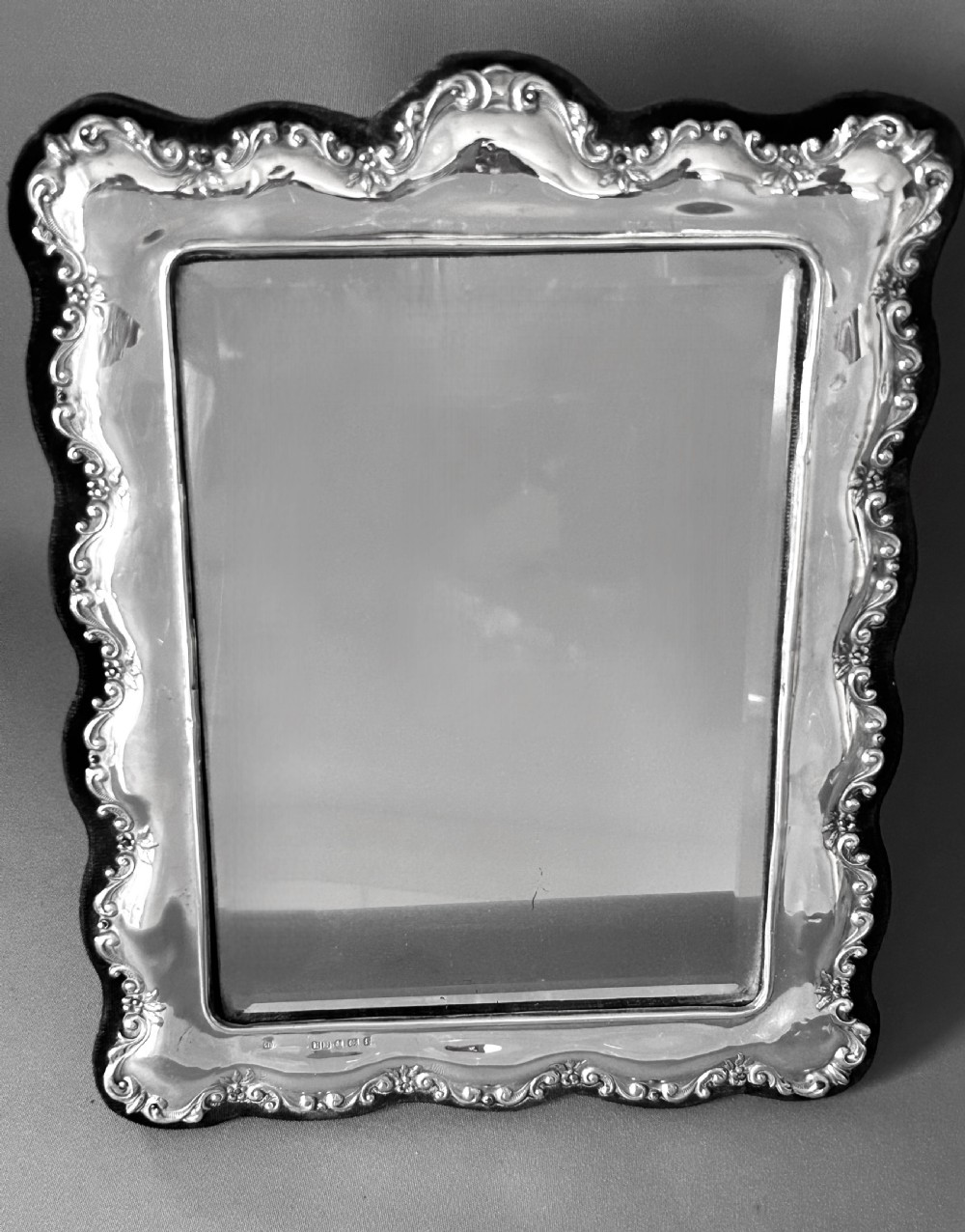 A handsome Edwardian silver table mirror View IV