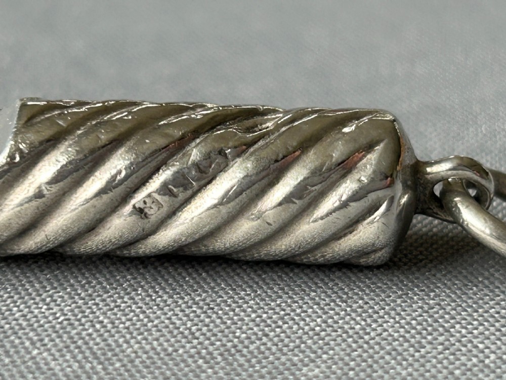A Sampson Morden small silver dog whistle View V