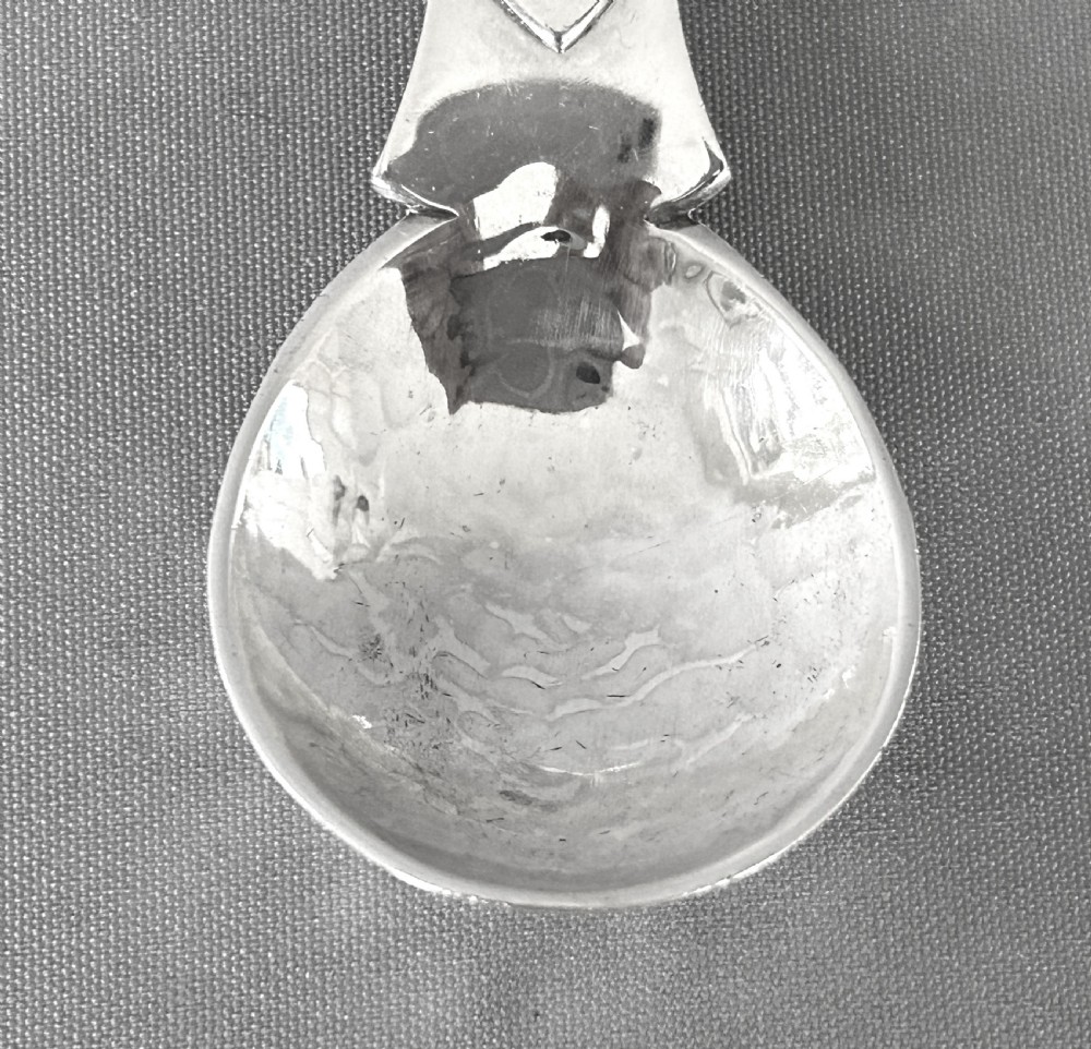 A Rare Arts & Crafts 'Tree of life' silver caddy spoon View III