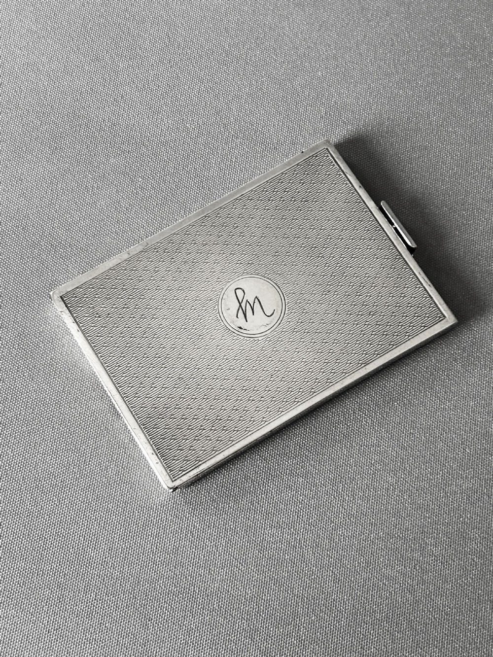 A superb Art Deco pocket silver stamp case