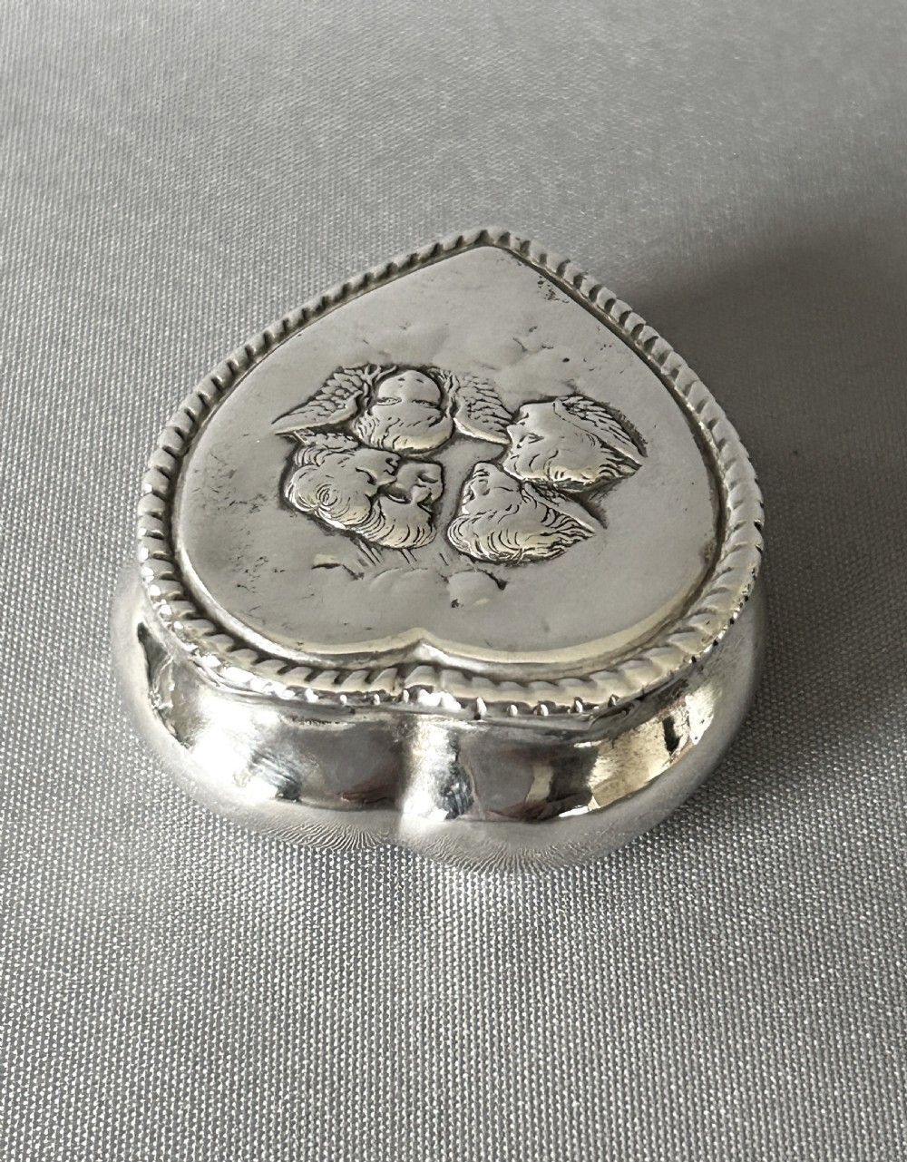 A late Victorian silver heart shaped pill box View III
