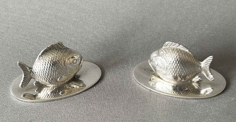 Rare pair of Sampson Morden silver fish menu holders