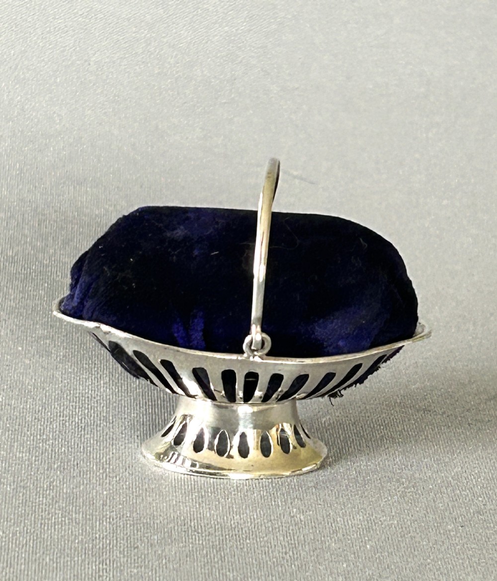 A Novelty silver fruit basket pin cushion View VI