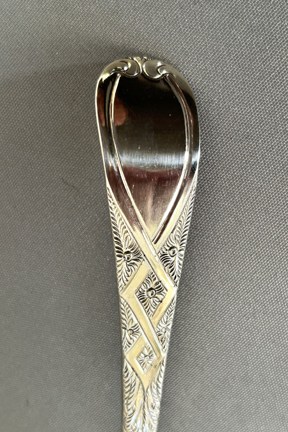 A fabulous Georgian silver sugar sifter spoon View III