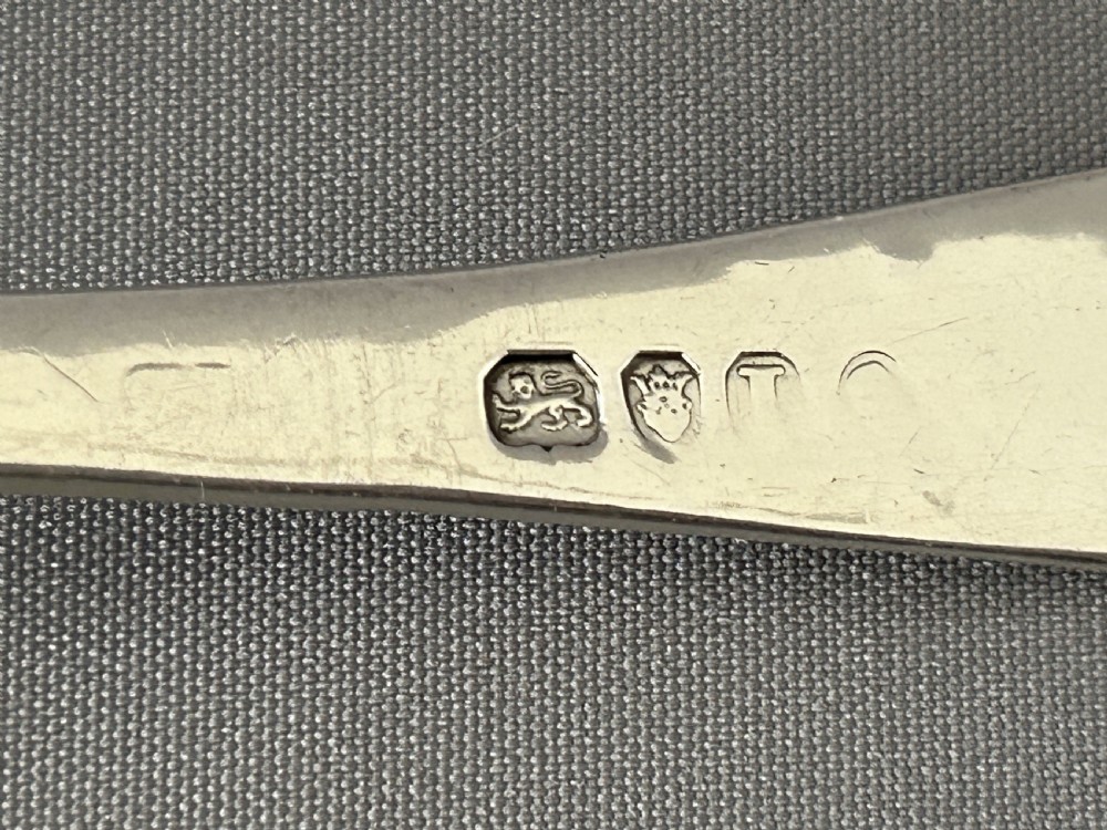A fabulous Georgian silver sugar sifter spoon View V