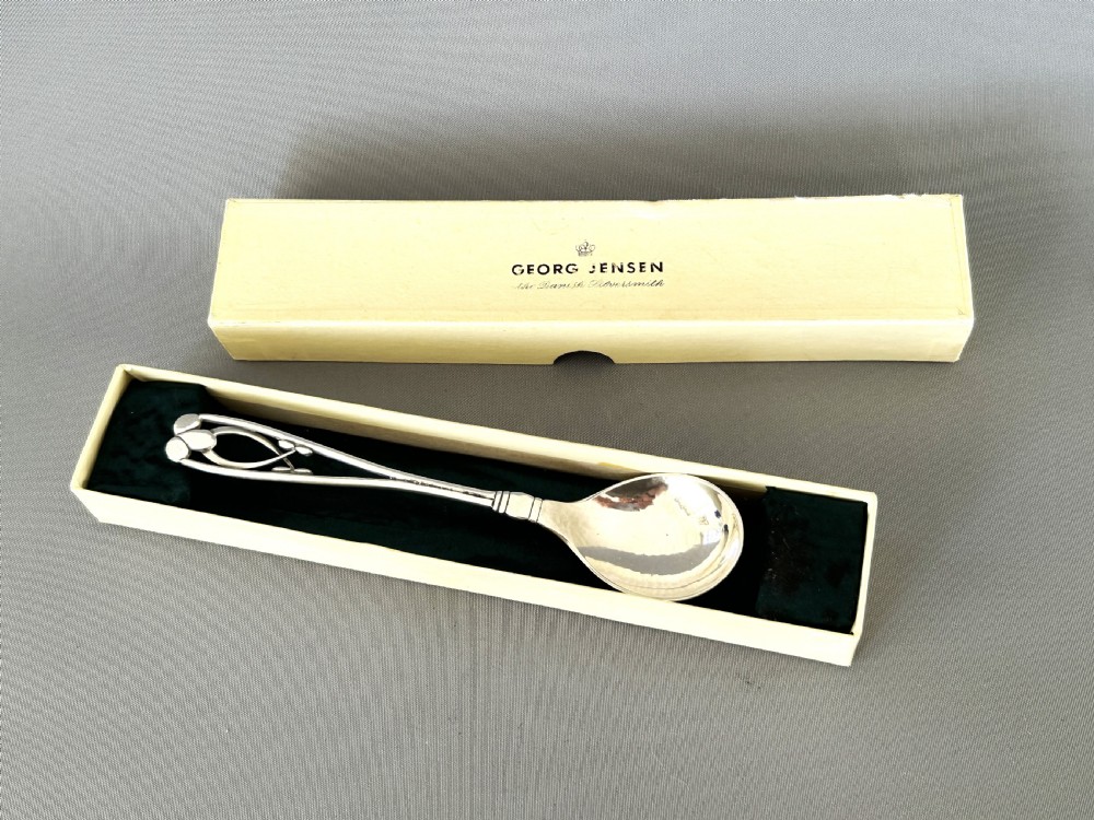 A boxed Art Deco George Jensen silver preserve spoon