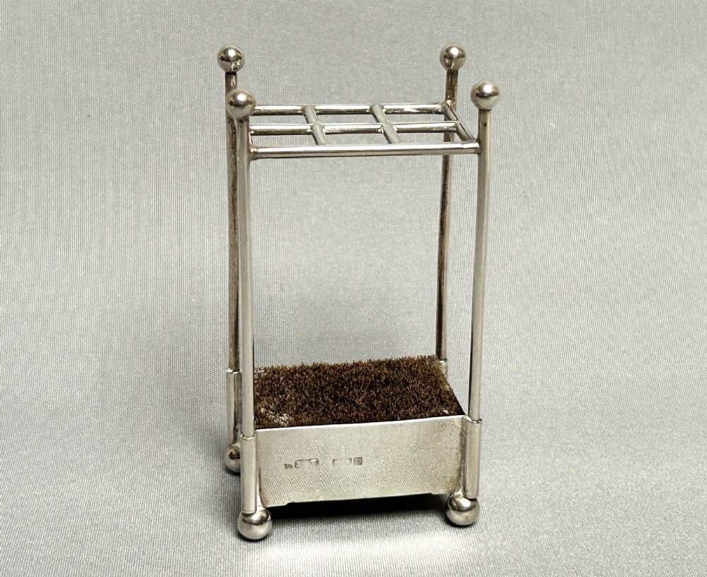 A rare novelty Edwardian silver 'stick stand' pen wipe View II