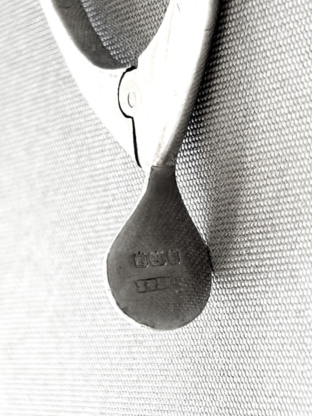 A pair of novelty silver wishbone sugar tongs View III