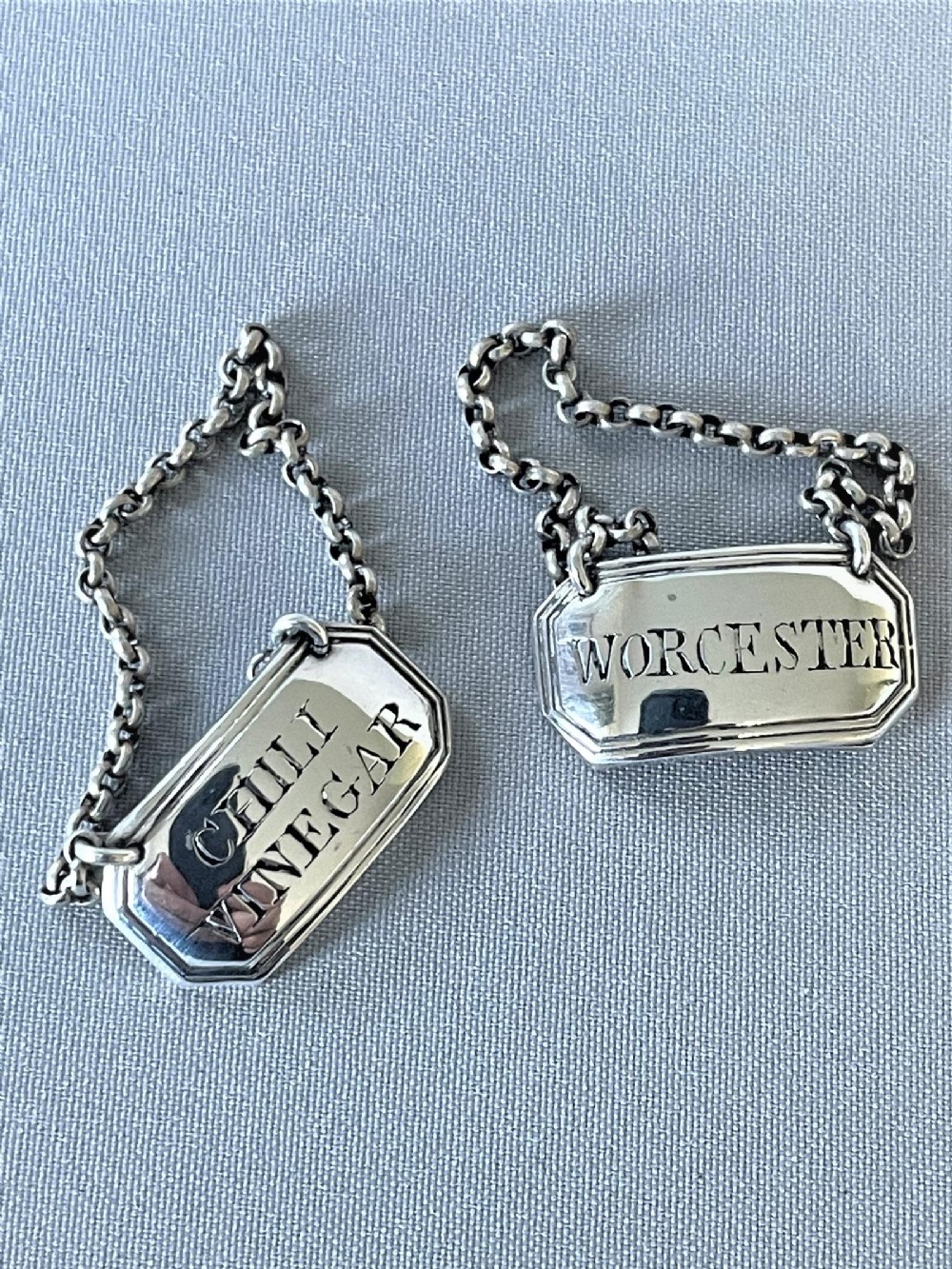 Rare pair of Georgian silver bottle tickets
