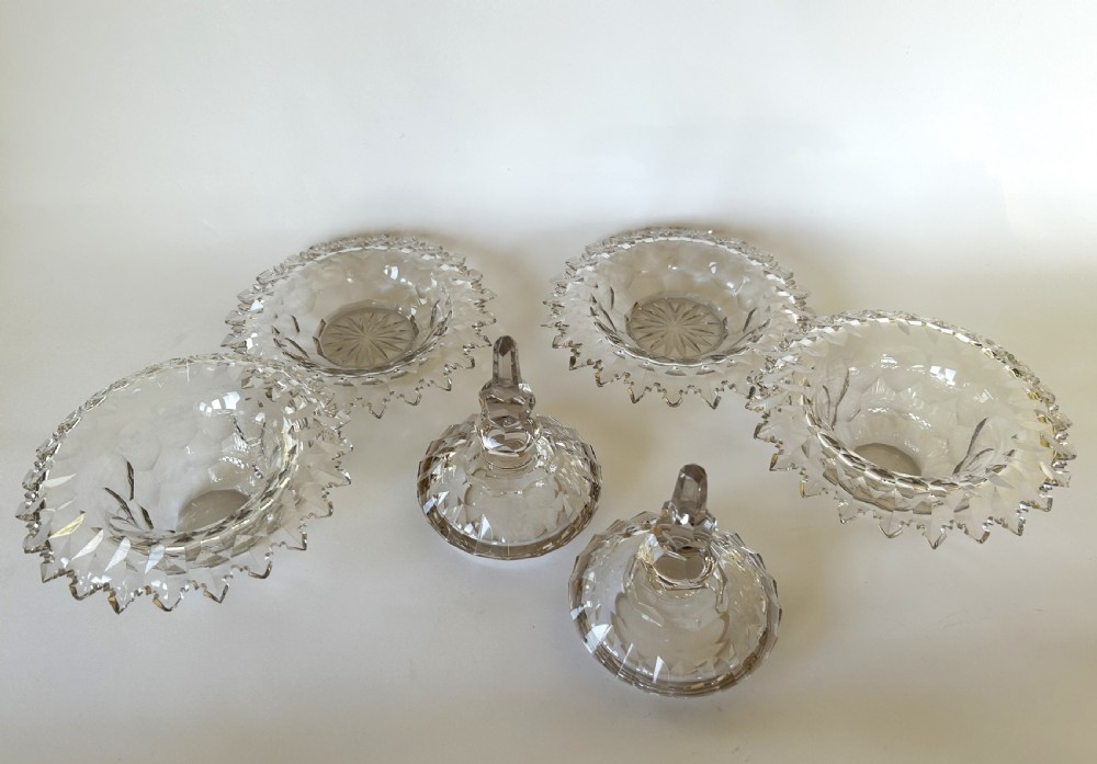 A fabulous pair of Victorian cut glass lidded butter dishes with saucers View V