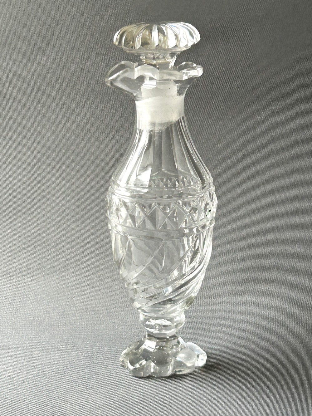 A lovely cut glass Georgian condiment bottle