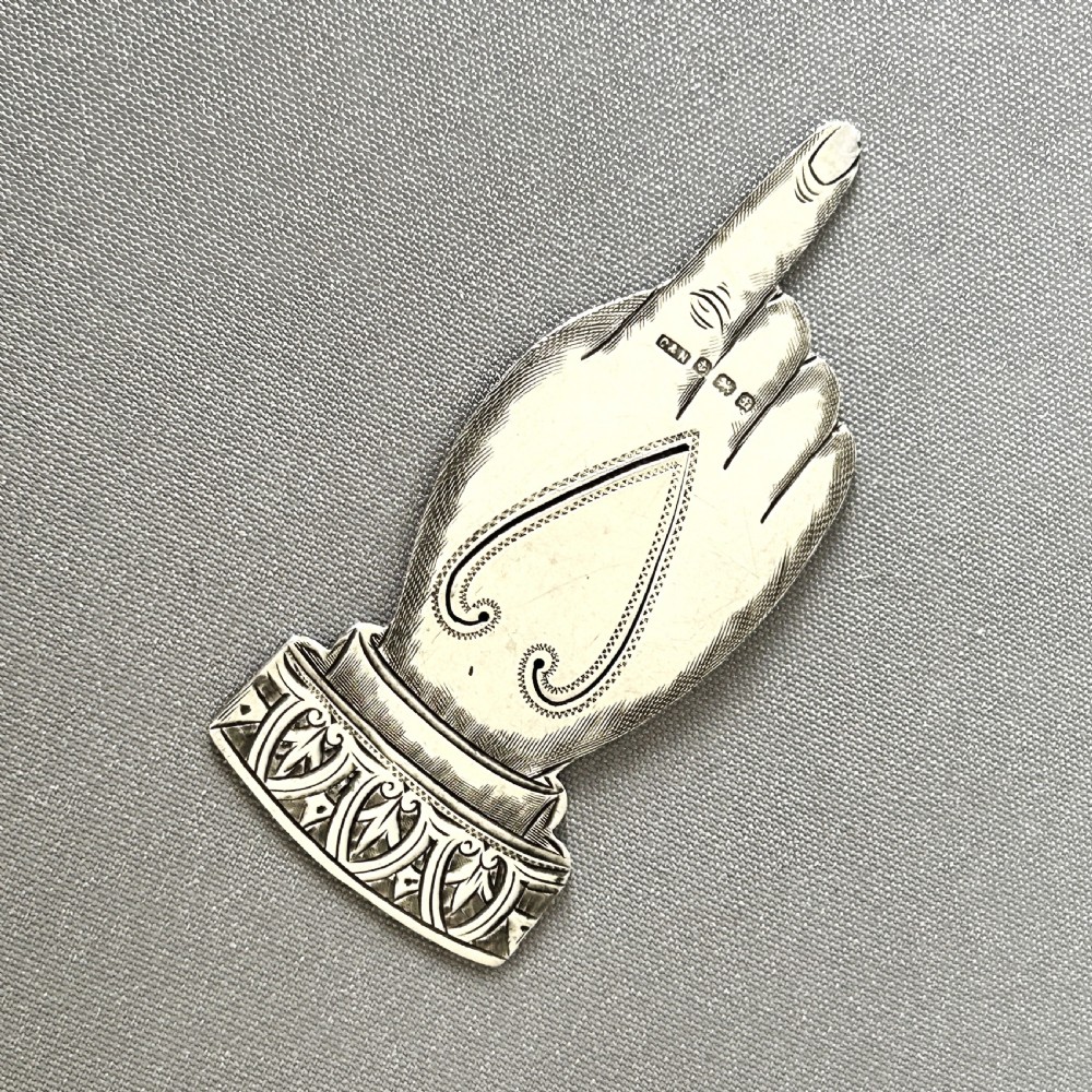 A rare Edwardian silver 'pointing finger' bookmark