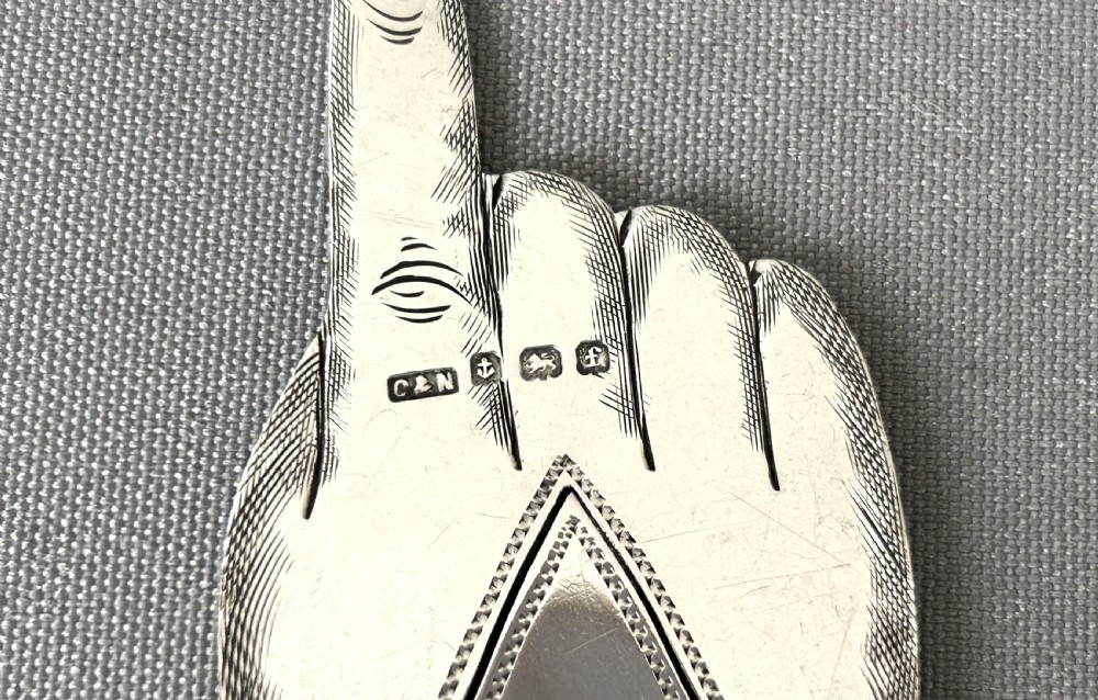 A rare Edwardian silver 'pointing finger' bookmark View V