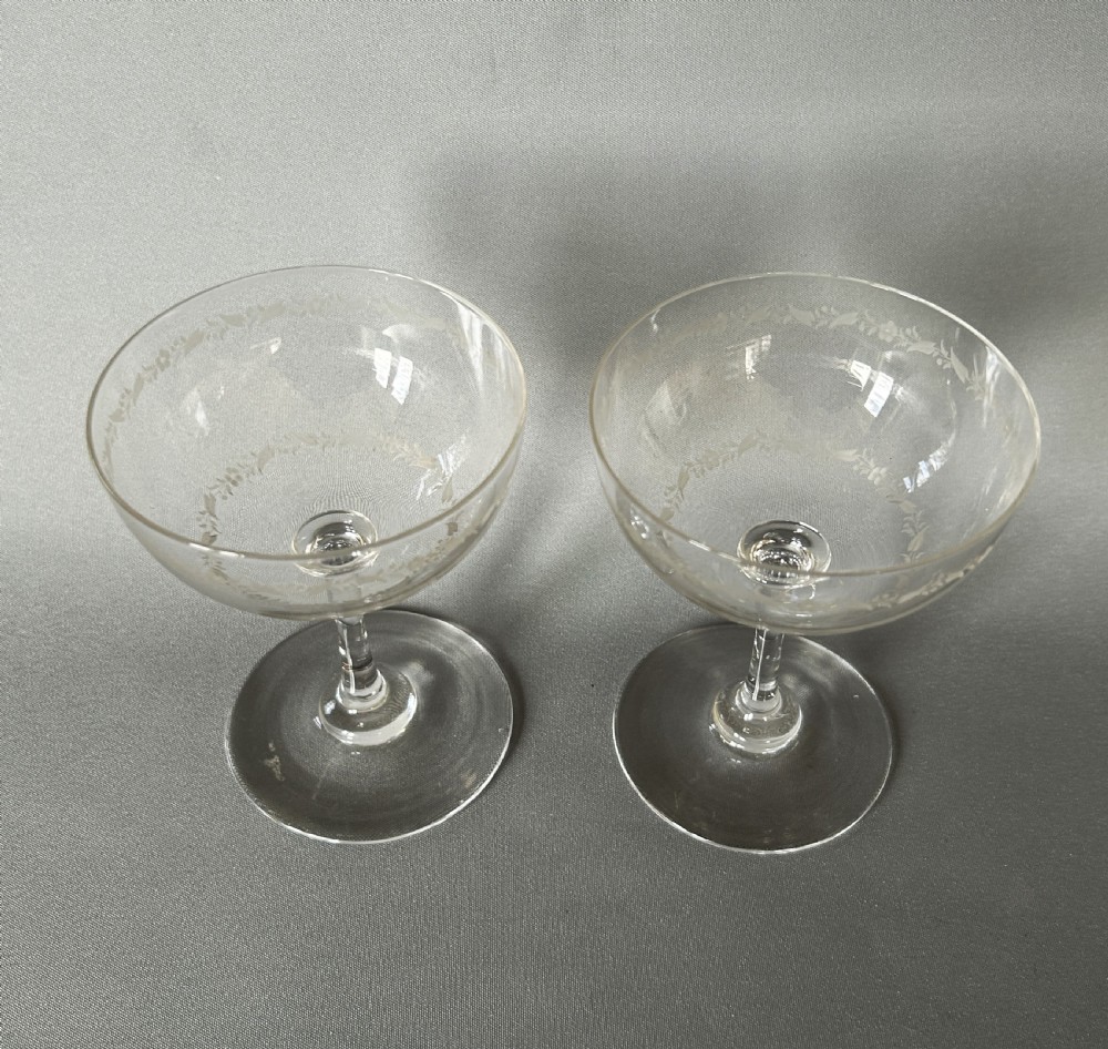 A charming pair of Edwardian etched glass champagne bowls View III