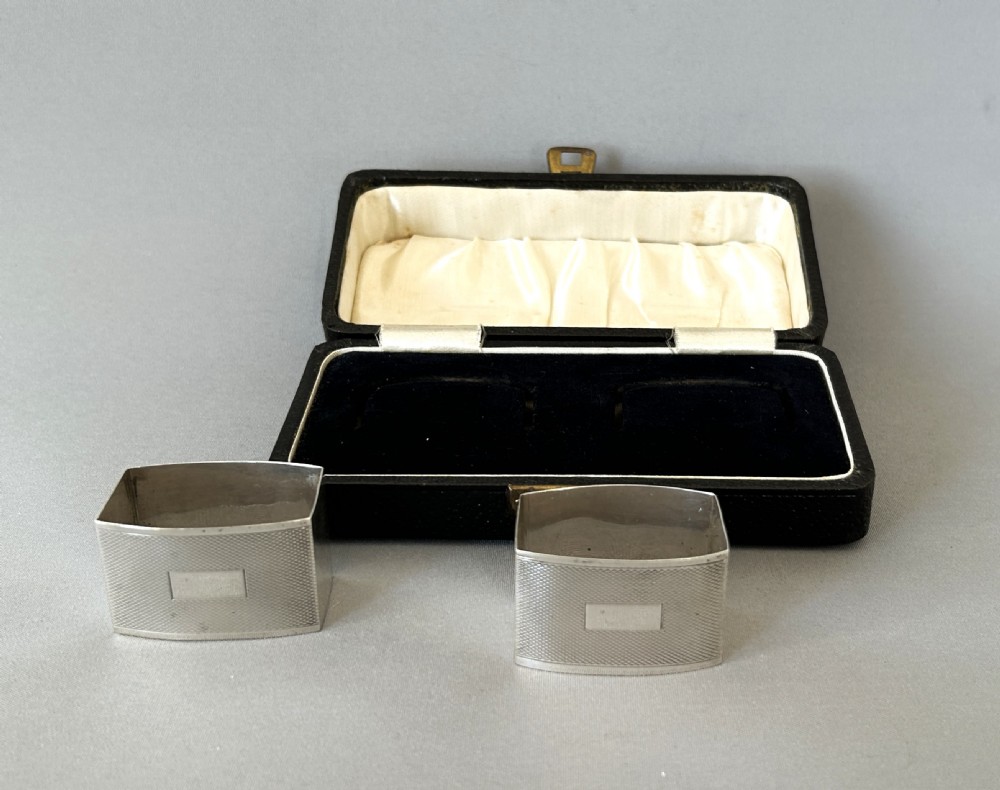 A stylish pair of Art Deco boxed silver napkin rings View III