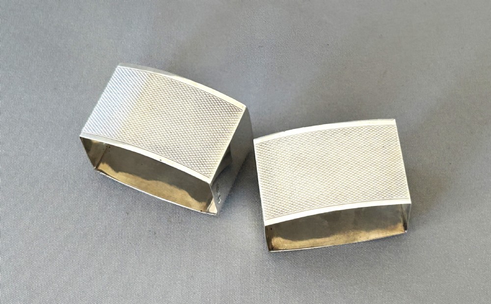 A stylish pair of Art Deco boxed silver napkin rings View VI