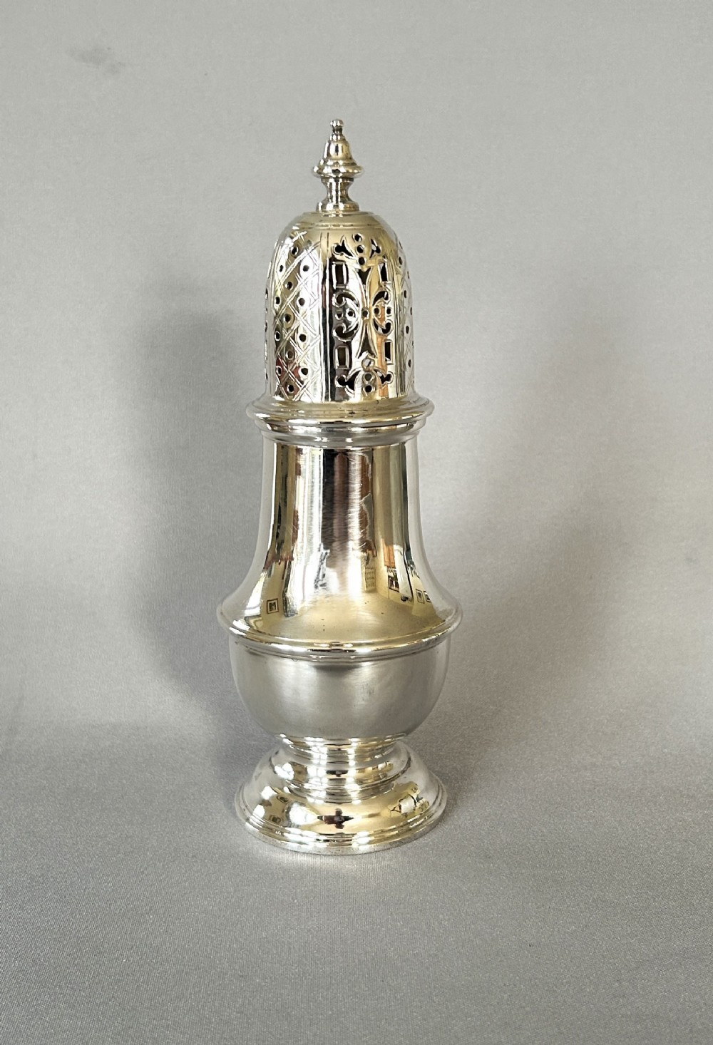 A handsome good quality silver sugar caster