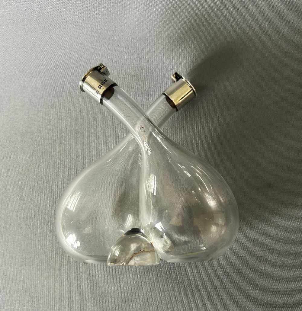 A charming Edwardian small silver mounted oil & vinegar duo View VIII