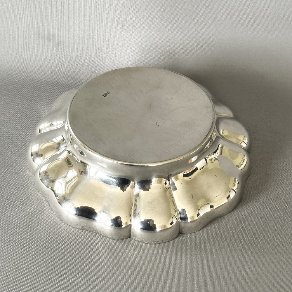 A handsome vintage silver wine bottle/decanter coaster View X