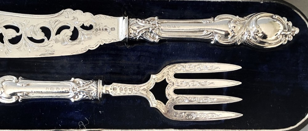 A stunning pair of boxed Victorian silver fish servers View V
