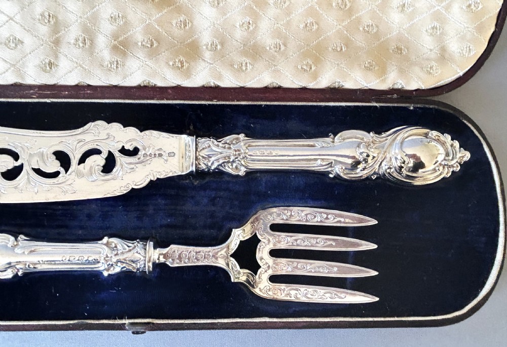 A stunning pair of boxed Victorian silver fish servers View VIII