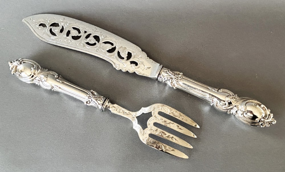 A stunning pair of boxed Victorian silver fish servers View XI