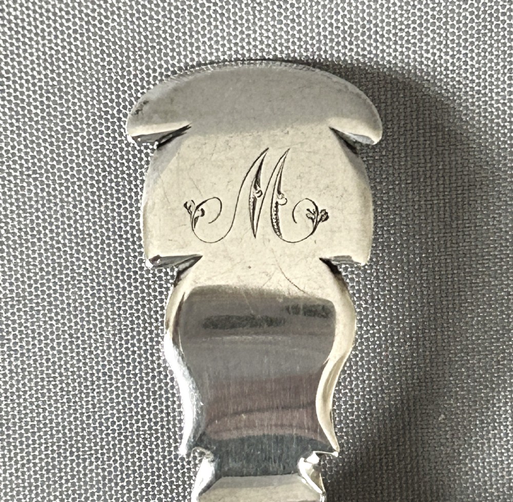 An unusual Georgian silver caddy spoon View III