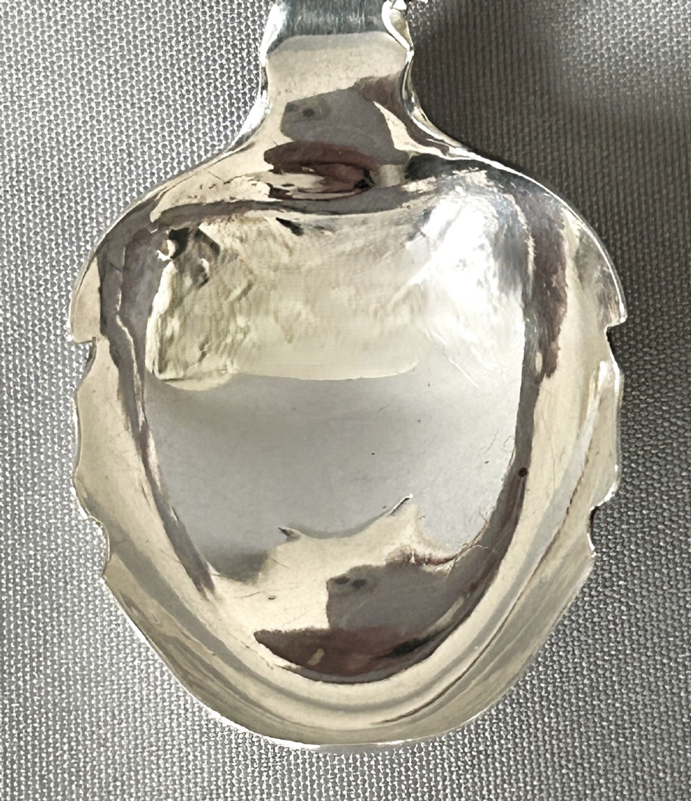 An unusual Georgian silver caddy spoon View IV