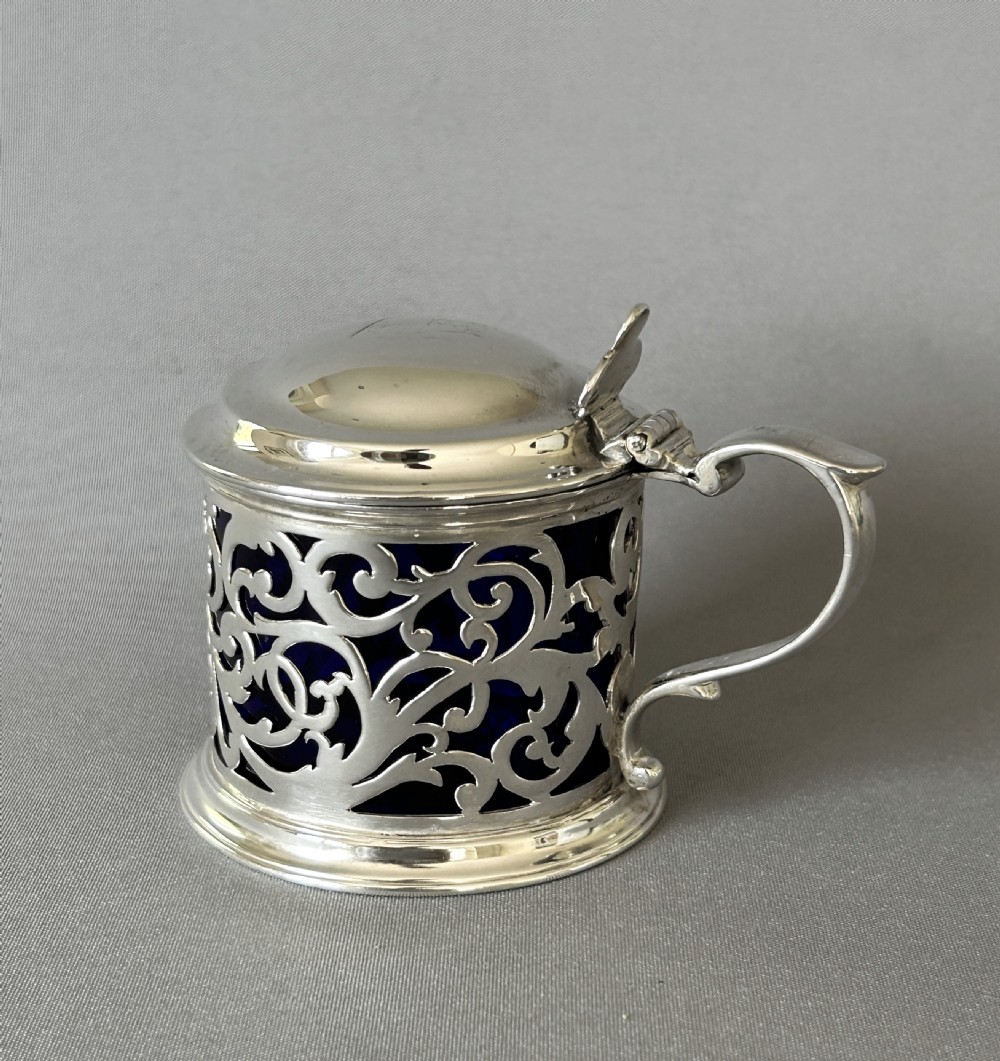 A superb Early Victorian pierced silver drum mustard pot