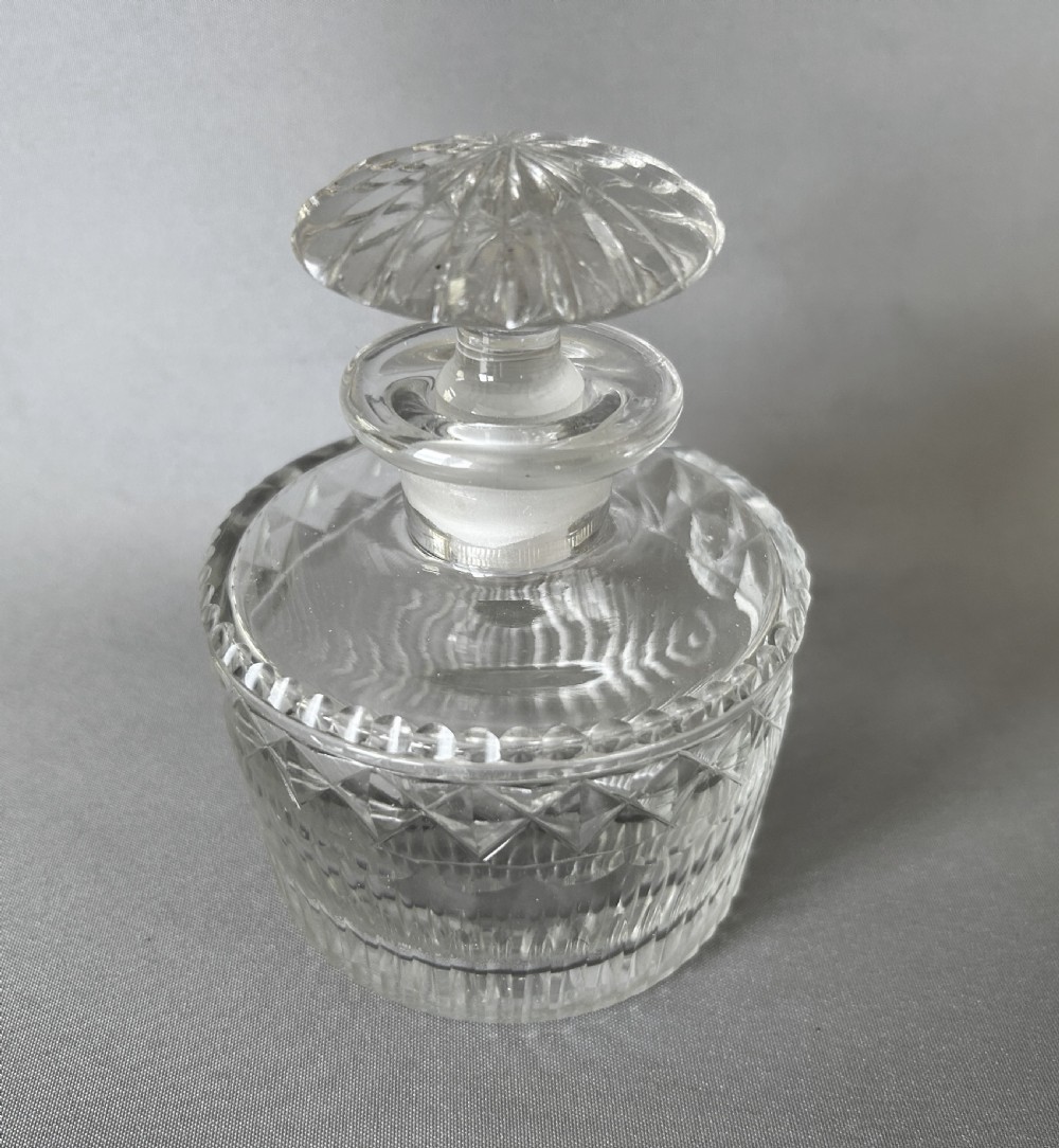 A Georgian Regency period cut glass table cologne bottle View V