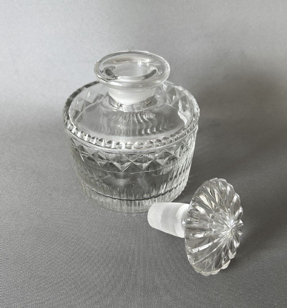 A Georgian Regency period cut glass table cologne bottle View VI