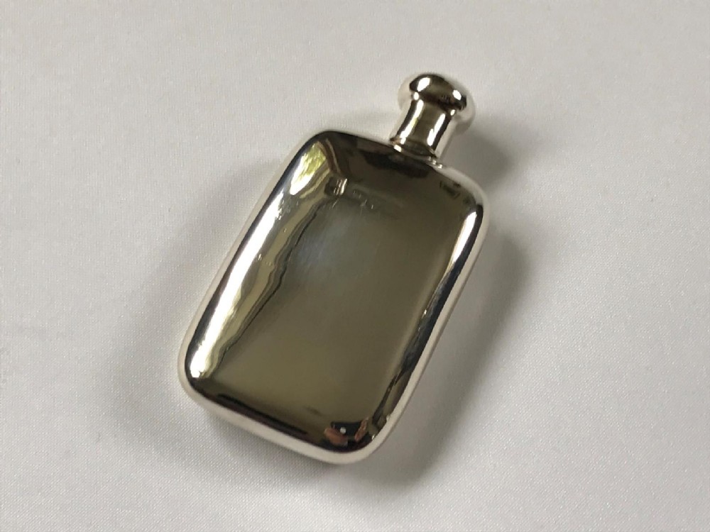 A novelty Victorian Chester silver 'hip flask' scent bottle