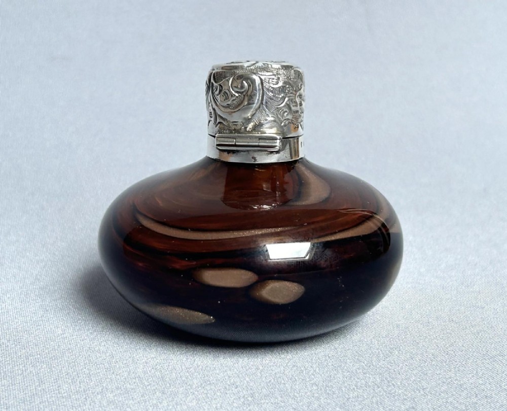 A wonderful silver & glass Edwardian scent bottle