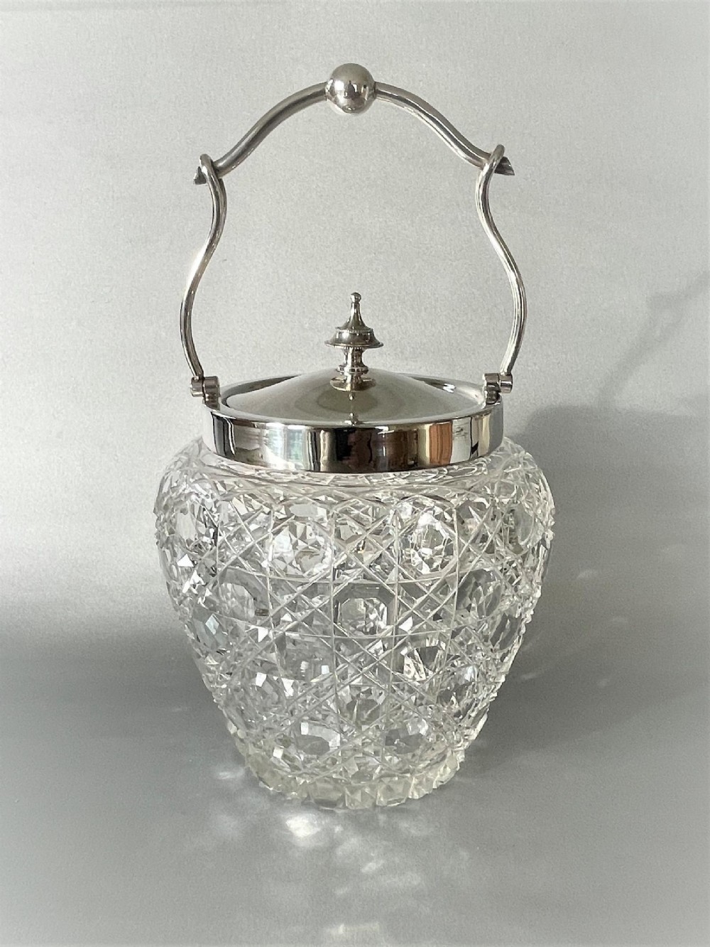 A Victorian silver plated & cut glass biscuit barrel