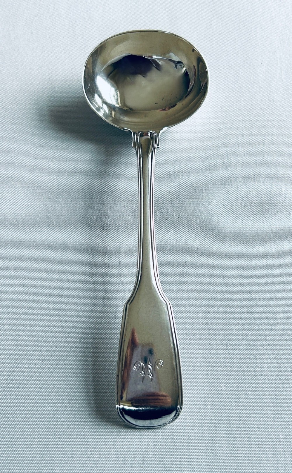 A William IV Fiddle & Thread silver gravy ladle