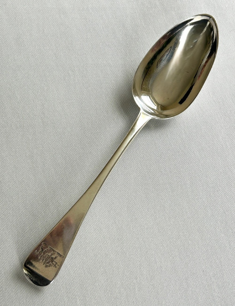 A handsome Georgian York silver serving/table spoon