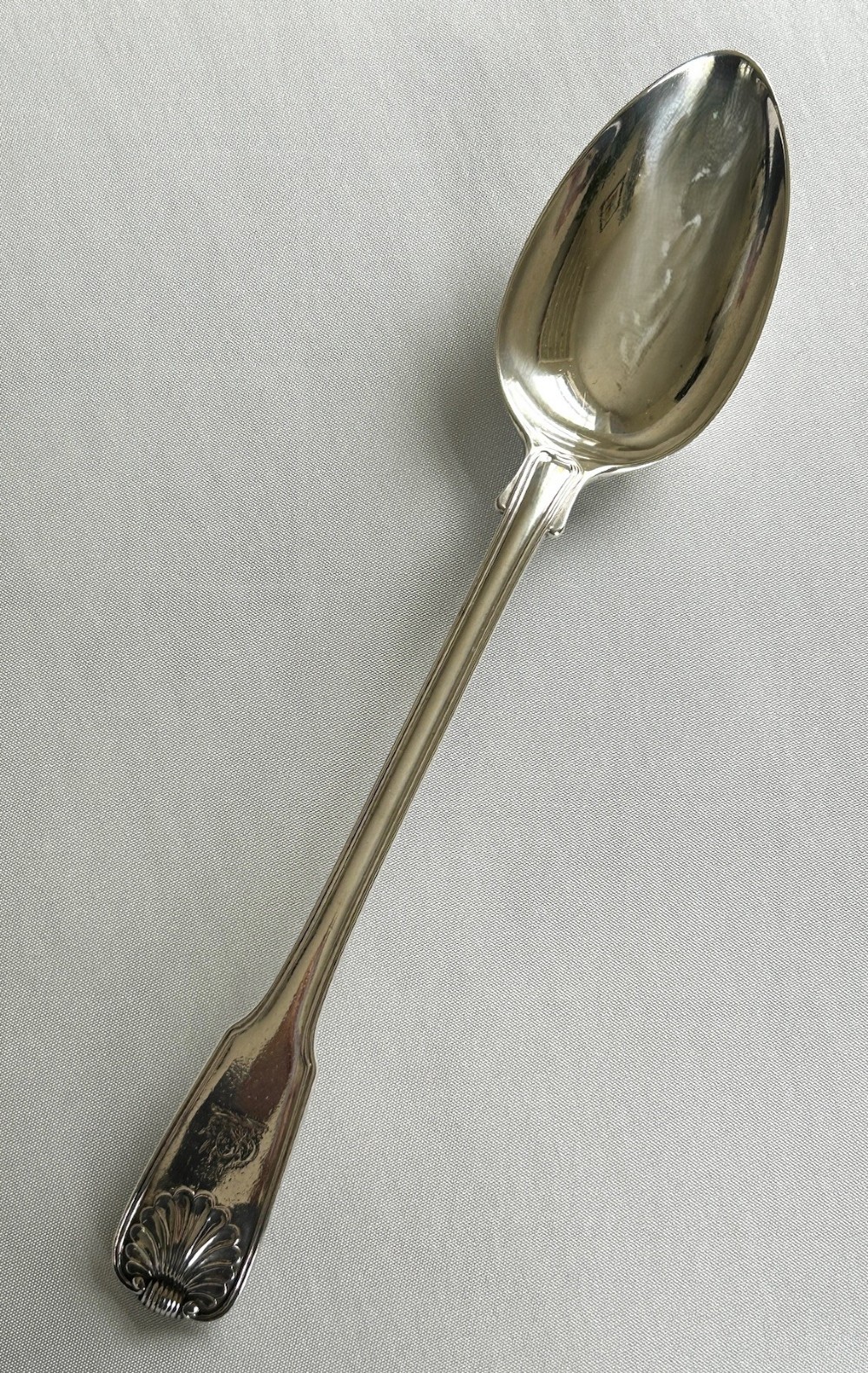  A superb Georgian silver fiddle, thread & shell stuffing spoon - Paul Storr ?