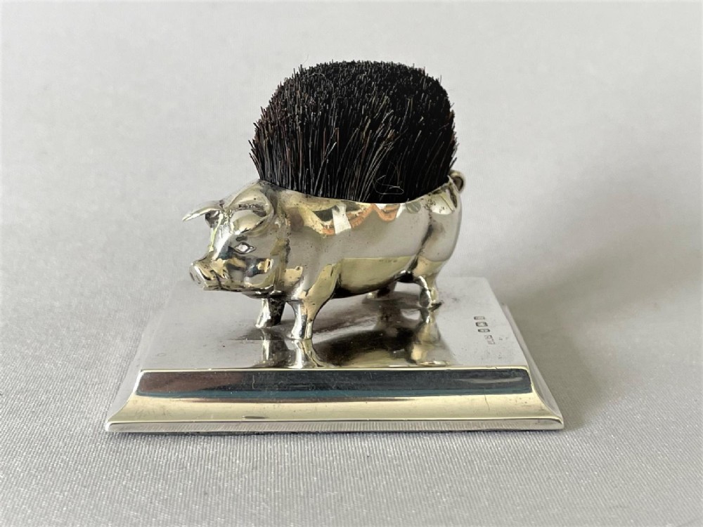 A rare Edwardian silver pig pen wipe