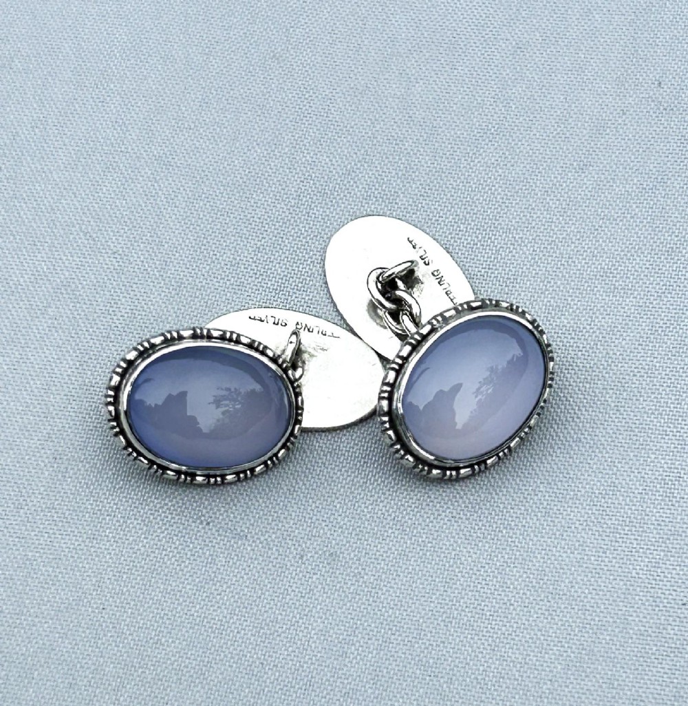 An Art Deco Pair of Silver & Chalcedony Cufflinks