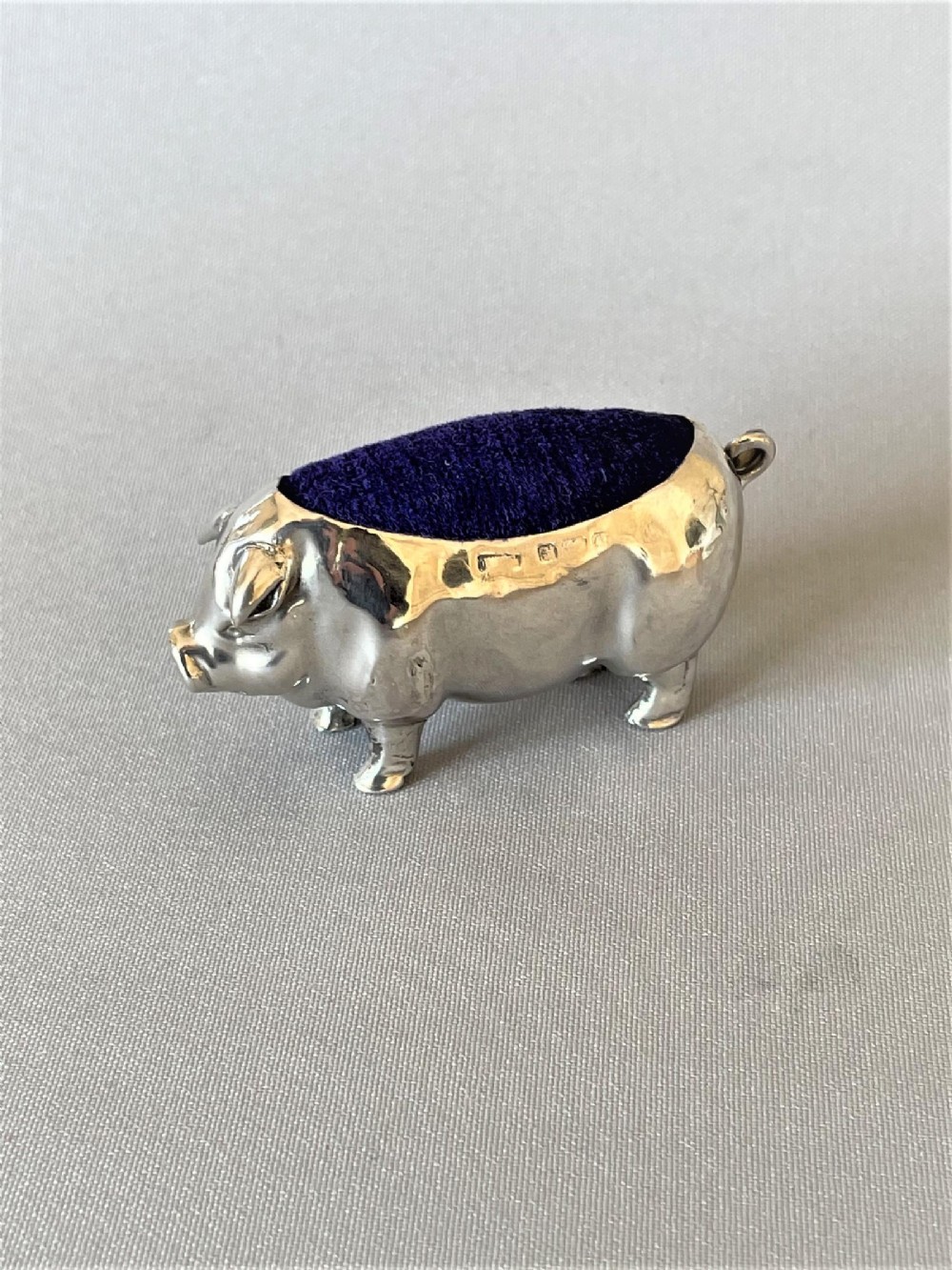A fine Edwardian silver pig pin cushion