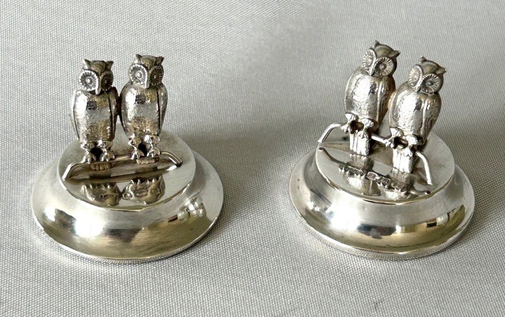A fabulous pair of Edwardian silver owl menu/card holders