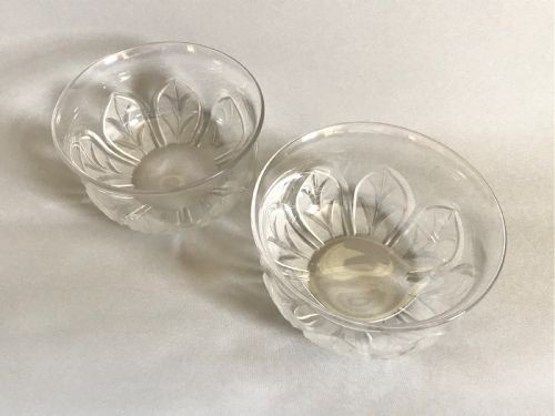 A pair of clear mid-Victorian glass finger bowls featuring cut and frosted leaf motifs around the lower body with flared rims. View II
