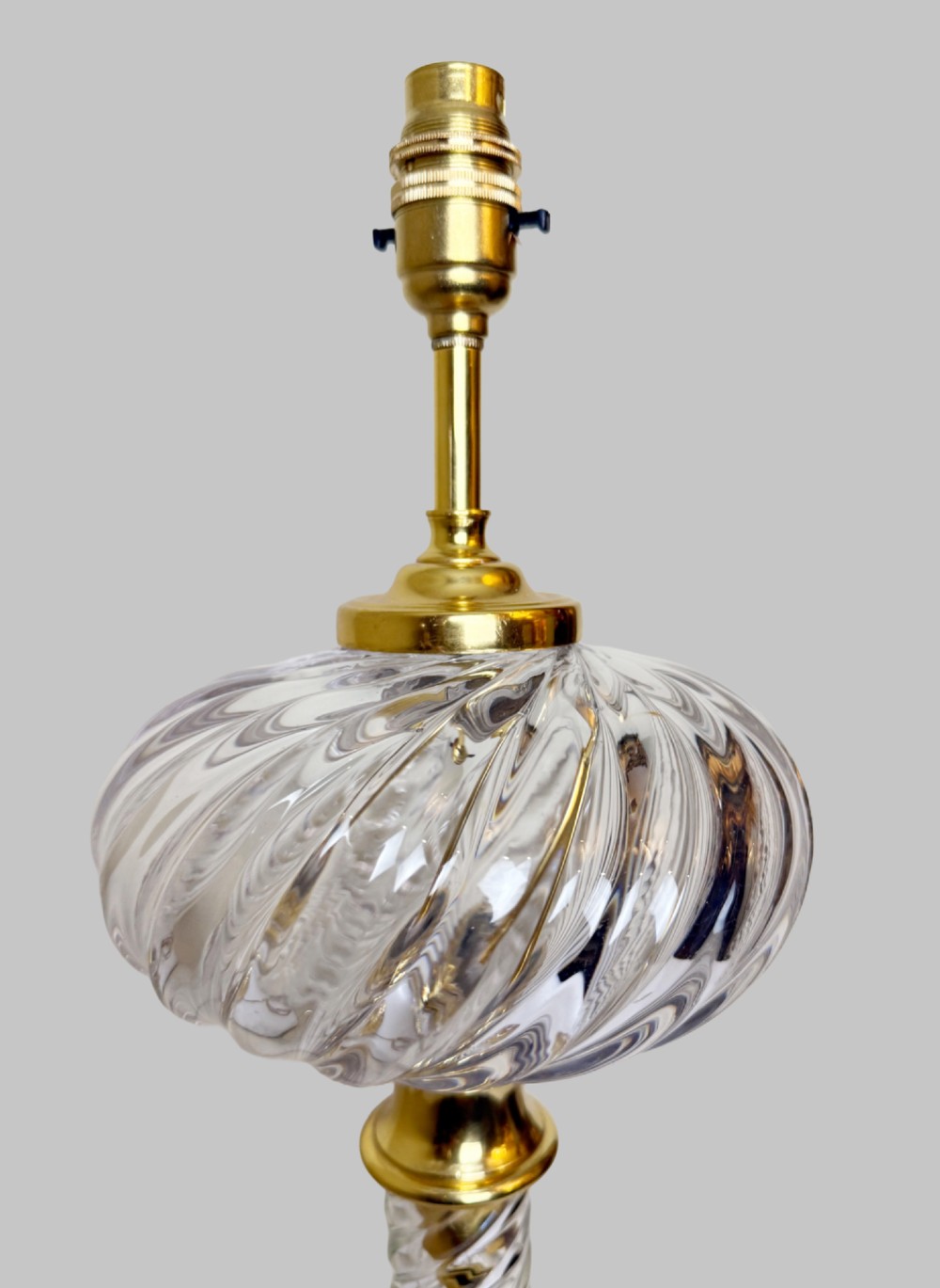 A 19th-century French table lamp featuring a twisted clear crystal column and swirled glass base accented with gilt bronze fittings. View III