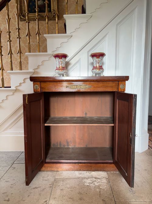 A LATE REGENCY ROSEWOOD SIDE CABINET WITH PLEATED CHIFFON PANELS - ADDITIONAL PHOTO 1