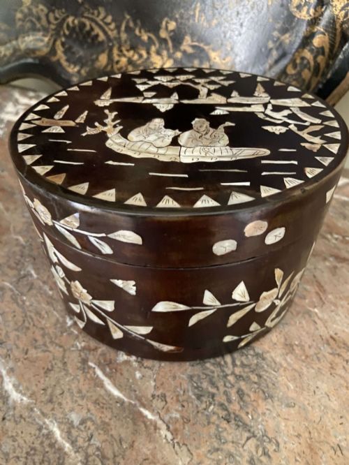 A Chinese Laquered Box with Mother of Pearl Inlaid
