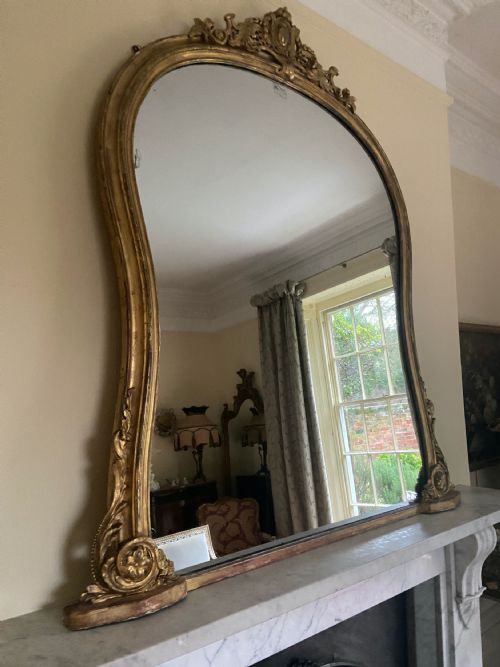 A LARGE GILTWOOD WAISTED OVERMANTLE MIRROR WITH CARVED PEDIMENT C 1850 - ADDITIONAL PHOTO 4