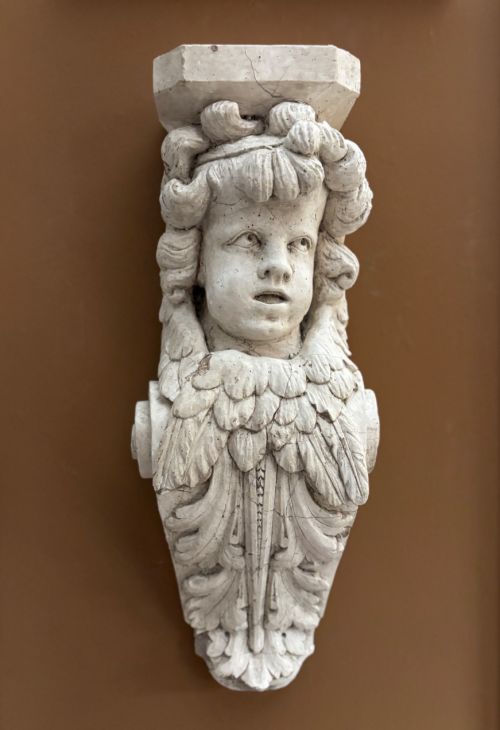 A 19TH CENTURY PUTTO WALL CORBEL C1850