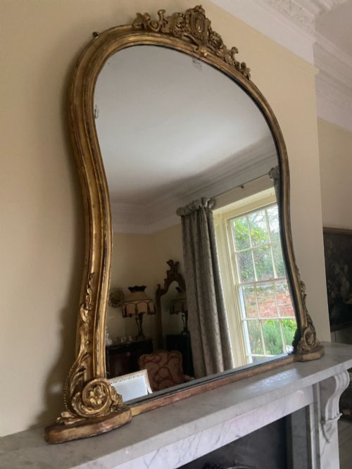 A Large Giltwood Waisted Overmantle Mirror with Carved Pediment C 1850