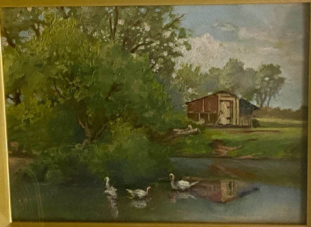 An impressionist oil painting on board depicting a serene rural pond with ducks, surrounding green trees, and a wooden barn, presented in an ornate gilt frame. View V